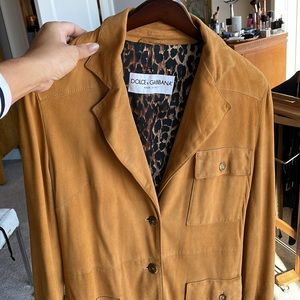 Dolce Gabbana suede jacket and skirt. Fully Lined in silk animal print .